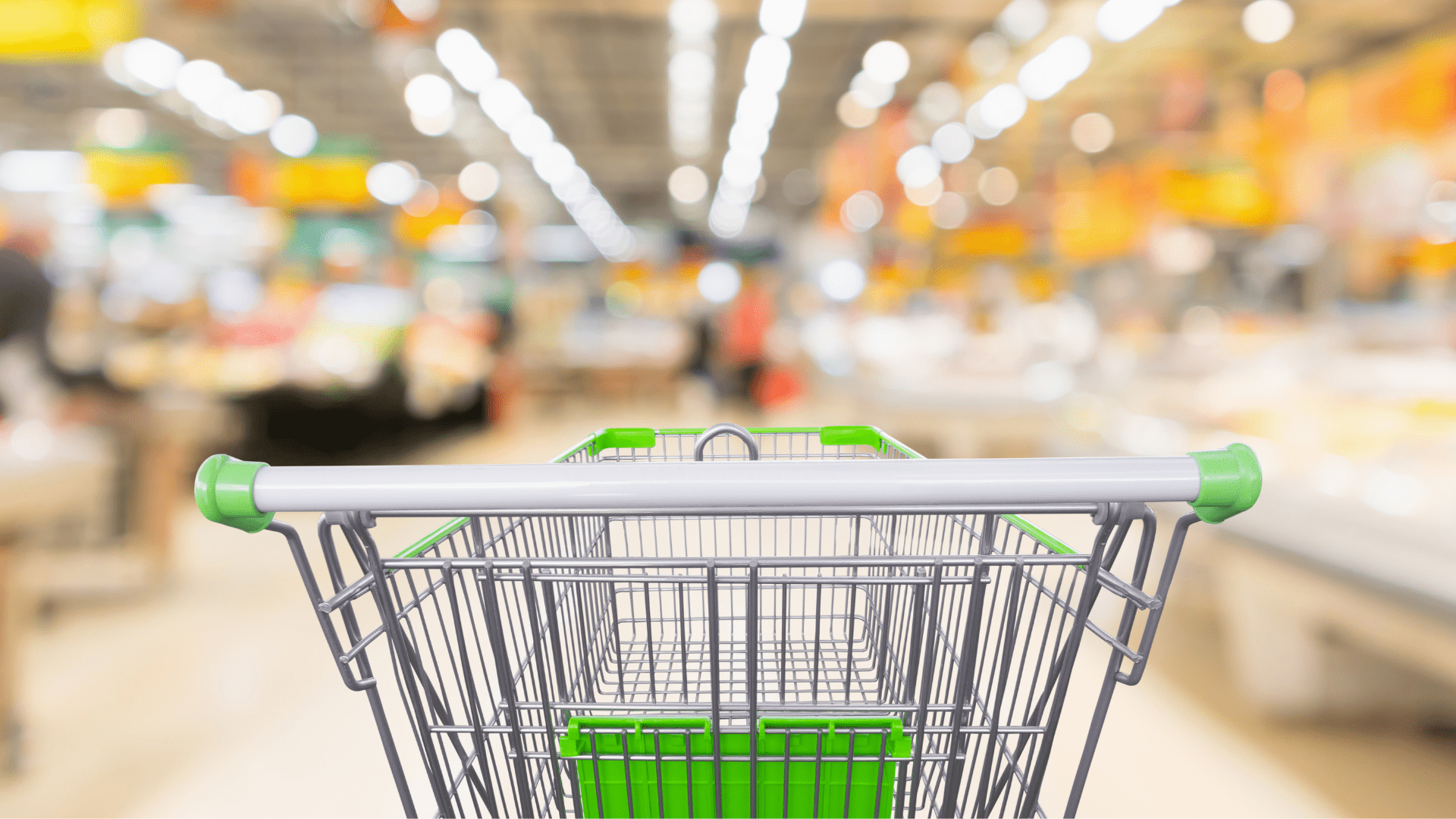 grey and green shopping card with blurred background